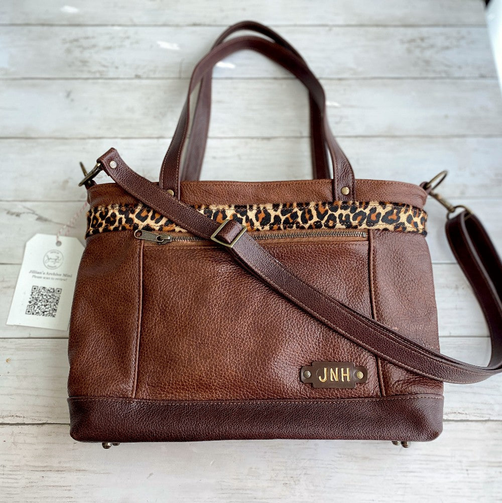 Jillian's Custom Archive Mini in Chestnut leather with Dark Roast leather accent and Leopard Bold hairon top stripe accent, antique brass hardware and monogram.