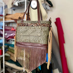 Load image into Gallery viewer, Rhonda&#39;s Custom Archive Mini in Moss Ostrich with Dark Roast cowskin leather accents, Leopard print cowskin top stripe accent, antique brass hardware, and lots of Dark Roast leather fringe on the sides and bottom
