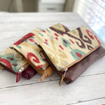 Load image into Gallery viewer, Foldover Clutch in IKAT/Camel
