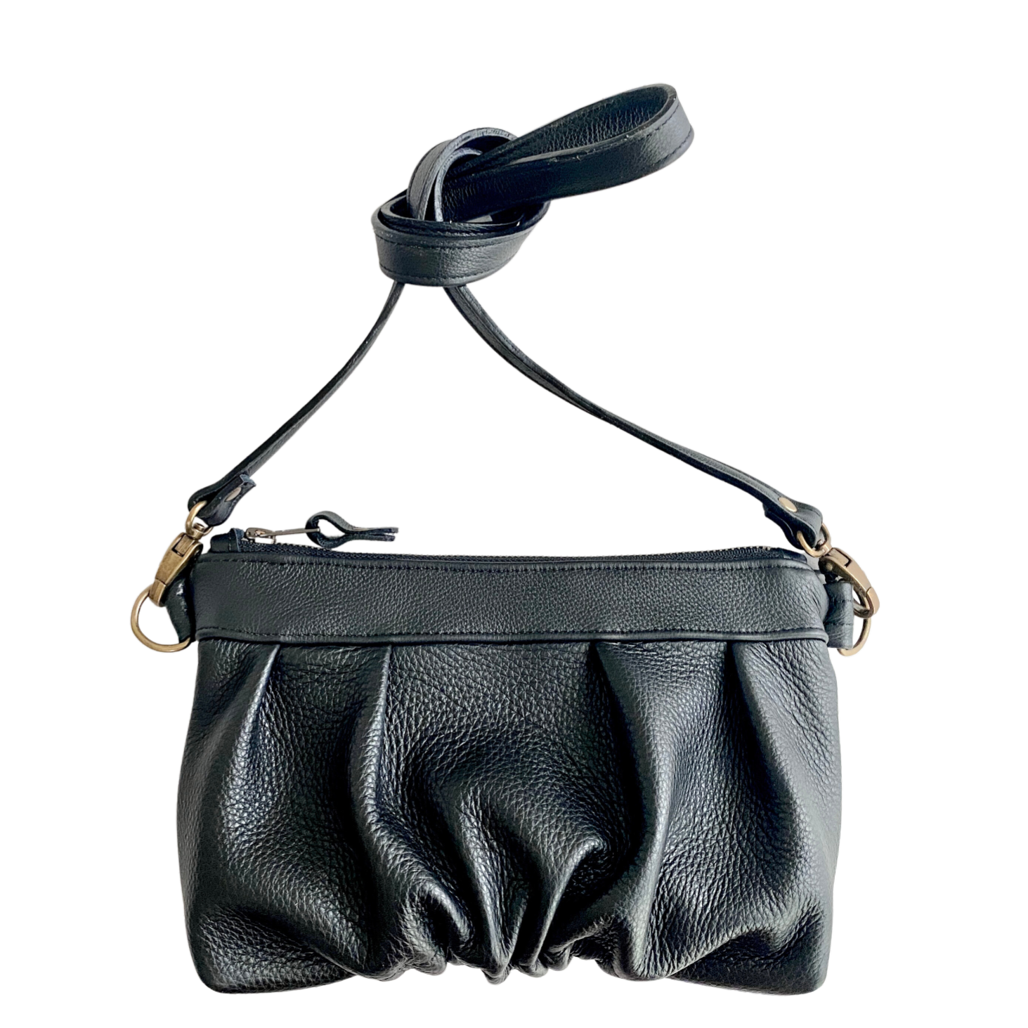 Ruche Clutch in Onyx black fullgrain cowskin leather with pleated detail, and crossbody strap
