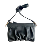 Load image into Gallery viewer, Ruche Clutch in Onyx black fullgrain cowskin leather with pleated detail, and crossbody strap
