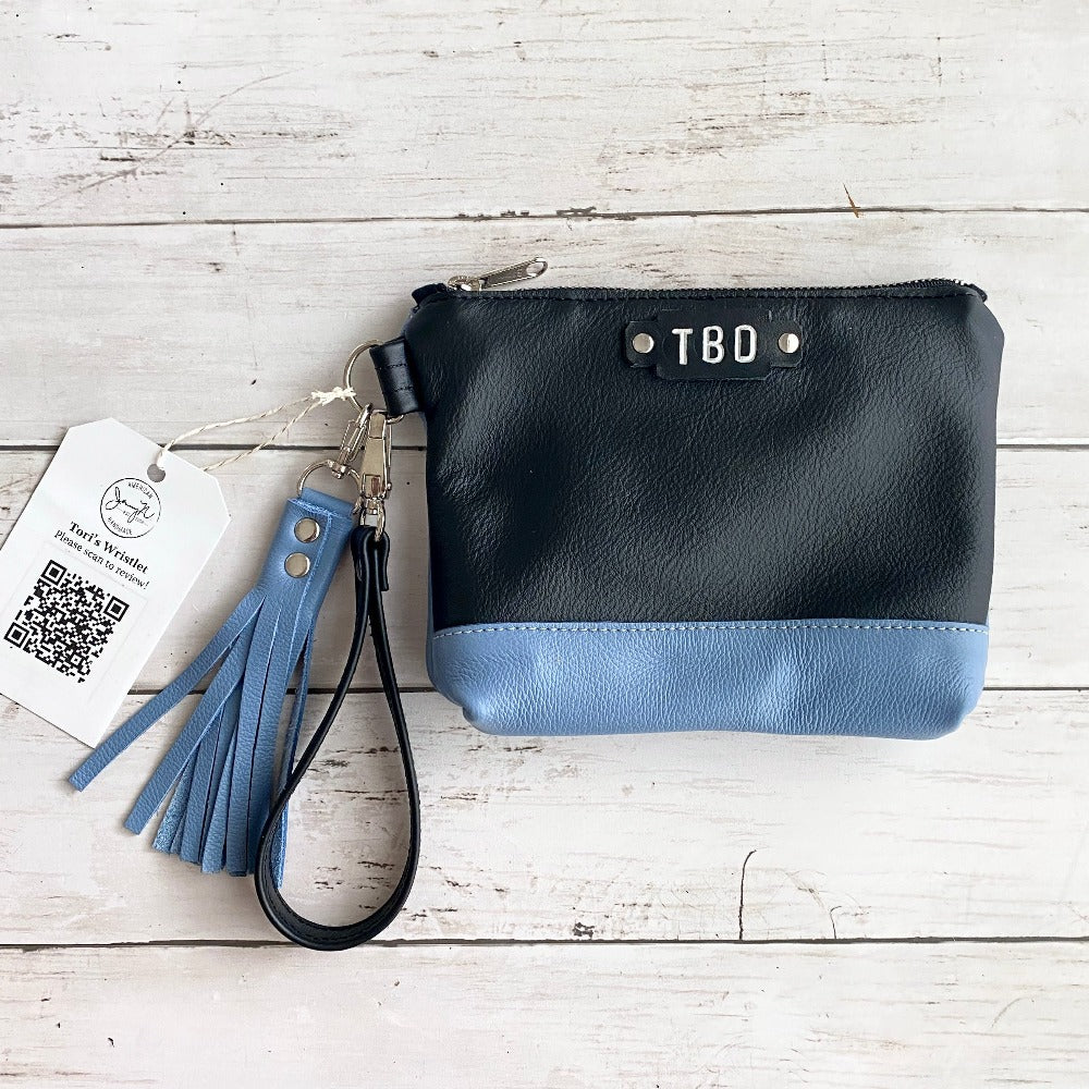 Tori's Custom Wristlet in Black smooth leather with Blue Fog leather accent and tassel, nickel hardware and monogram