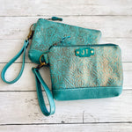 Load image into Gallery viewer, Wristlet in Turquoise Floral Leather
