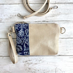 Load image into Gallery viewer, Wristlet in Hand Painted Floral Navy, Wheat, Crossbody Strap
